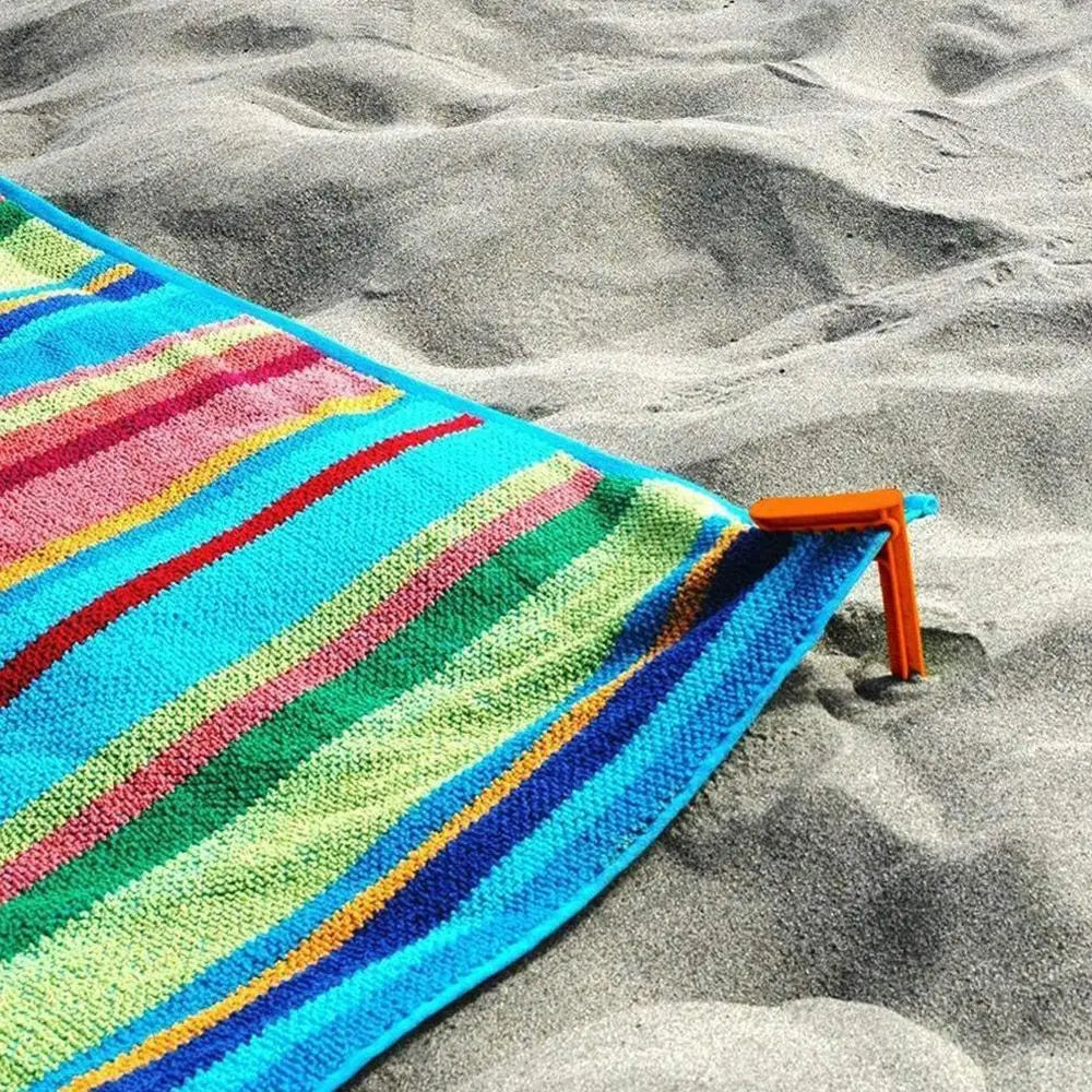 Juego de 4 pinzas multiusos: para toallas de playa, esterillas de camping, sábanas, ropa y tiendas de campaña.