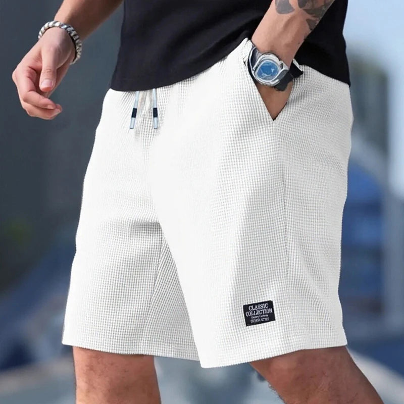 Pantalones cortos y casuales para hombre, shorts de playa y deportivos, nueva moda en tejido texturizado, pantalones transpirables, adecuados tanto para uso diario casual como para practicar deporte.